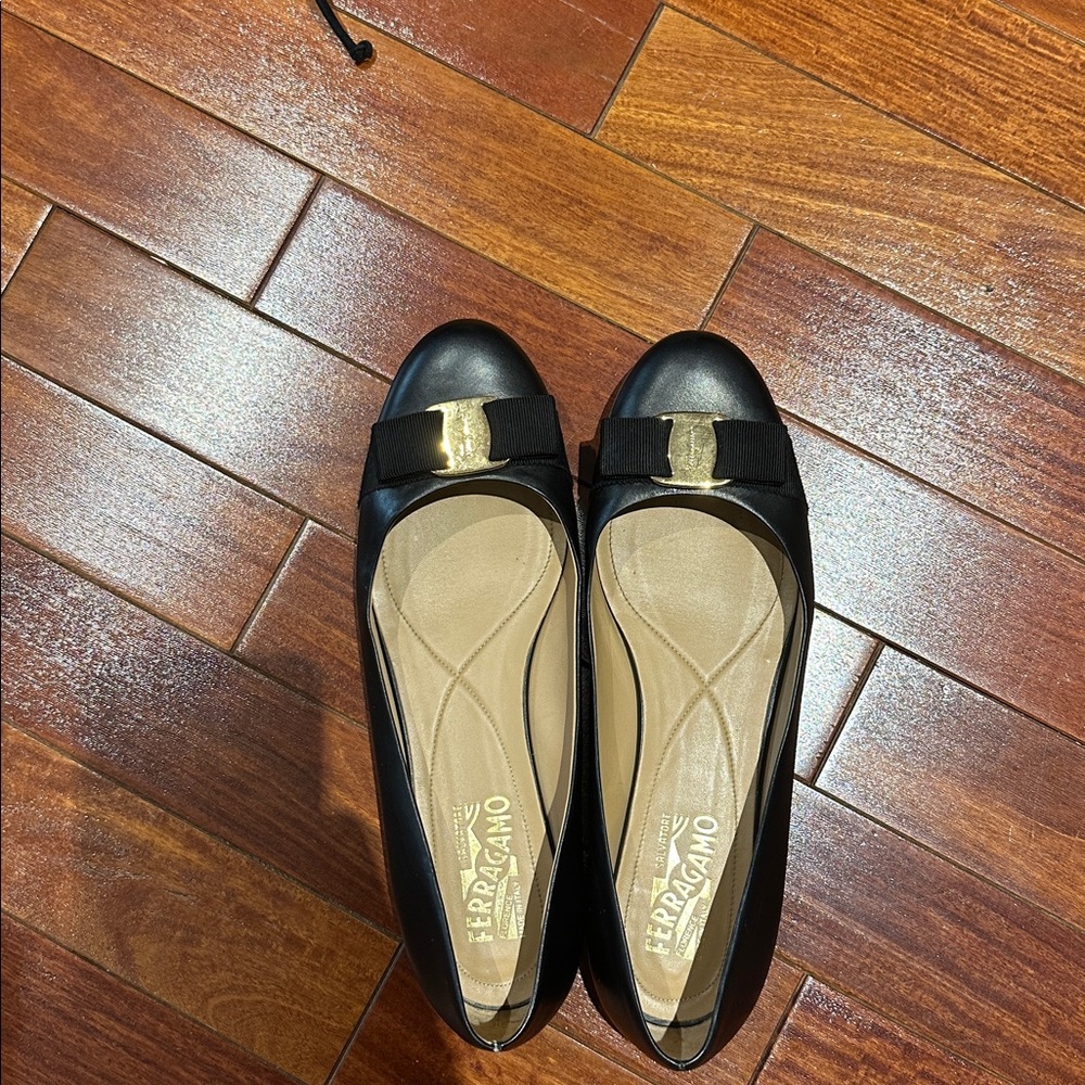 Salvatore Ferragamo Leather Black Flats with Gold Accent